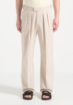 relaxed-fit-twin-pleat-pinstripe-trousers-beige