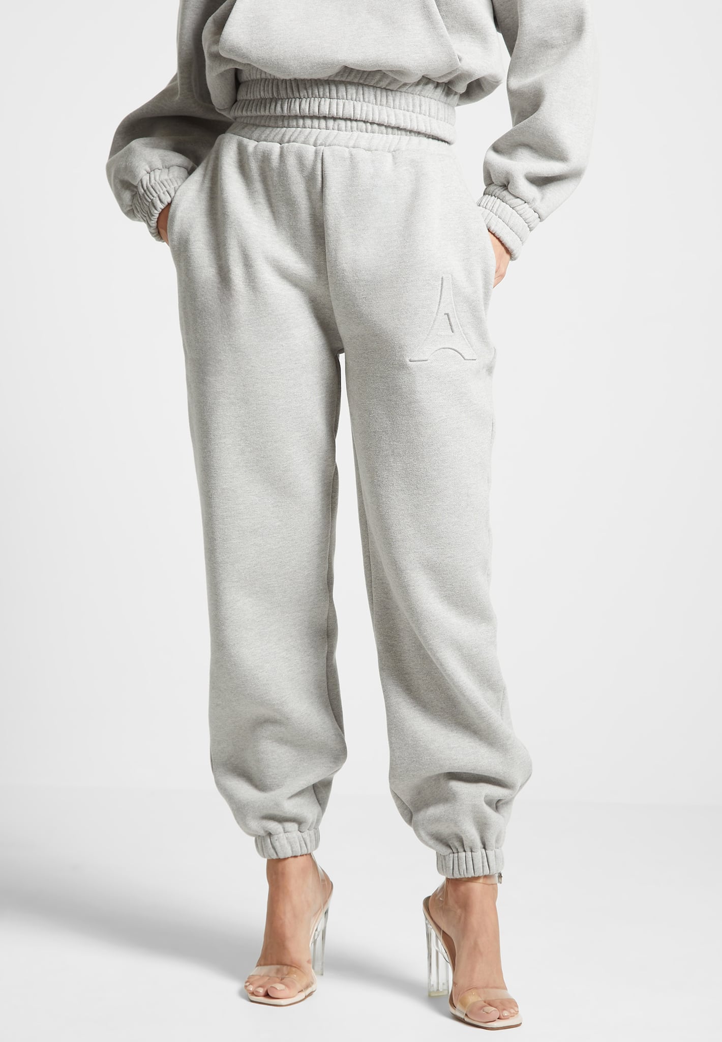 eternelle-eiffel-embossed-joggers-light-grey