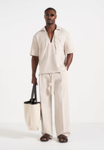 wide-leg-textured-trousers-with-belt-cream