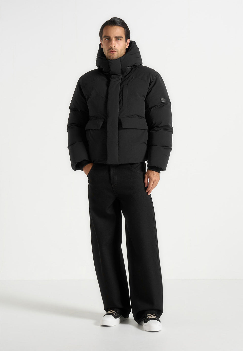 casey-unisex-minimal-raglan-puffer-jacket-black
