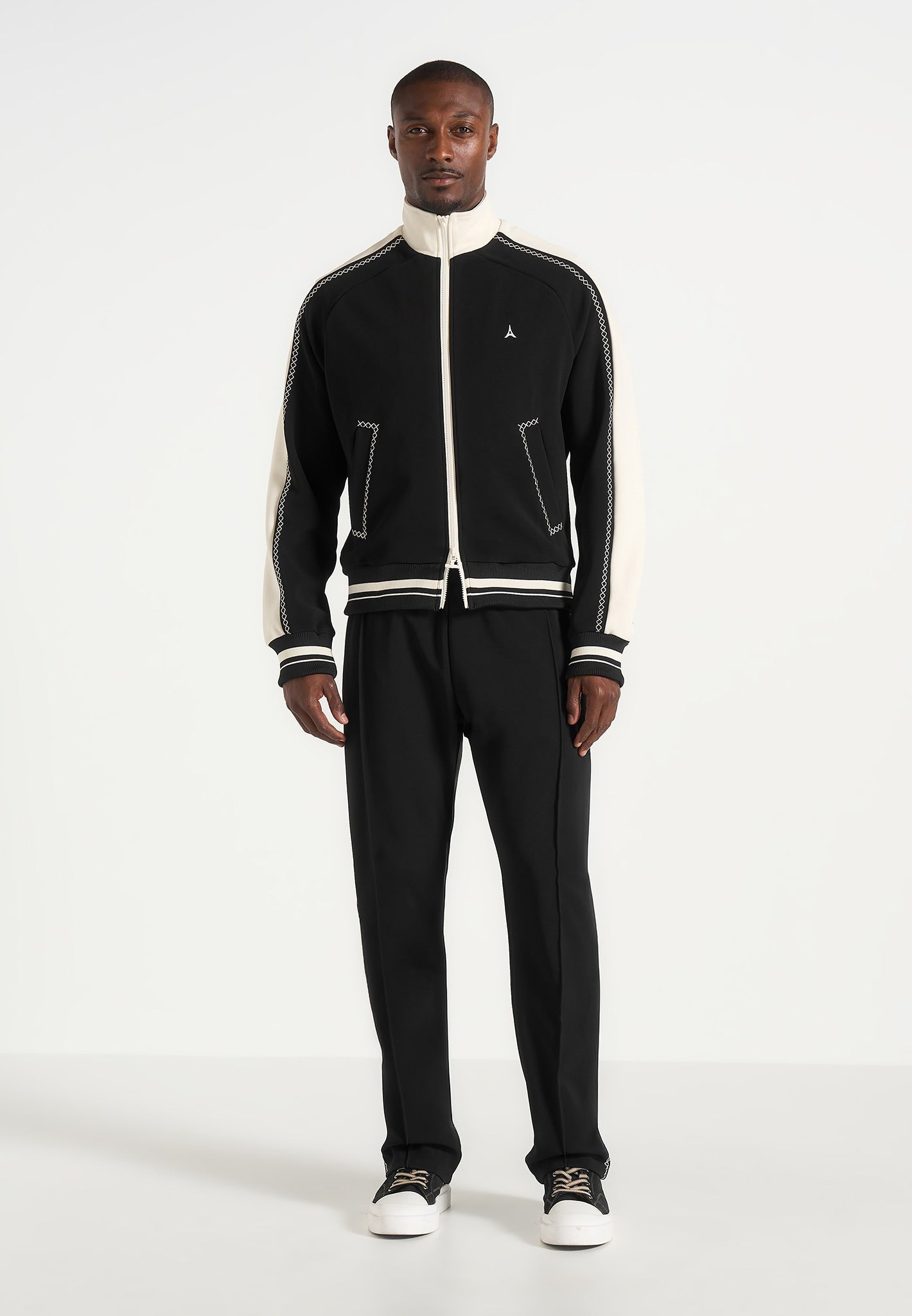 tristan-contrast-whipstitch-raglan-track-jacket-black