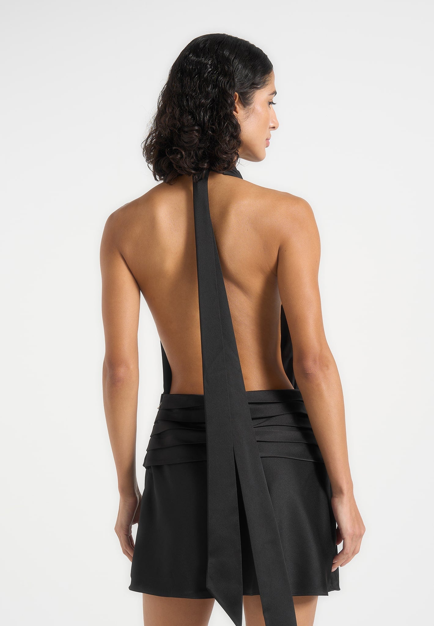 christelle-cowl-halter-open-back-rosette-mini-dress-black 