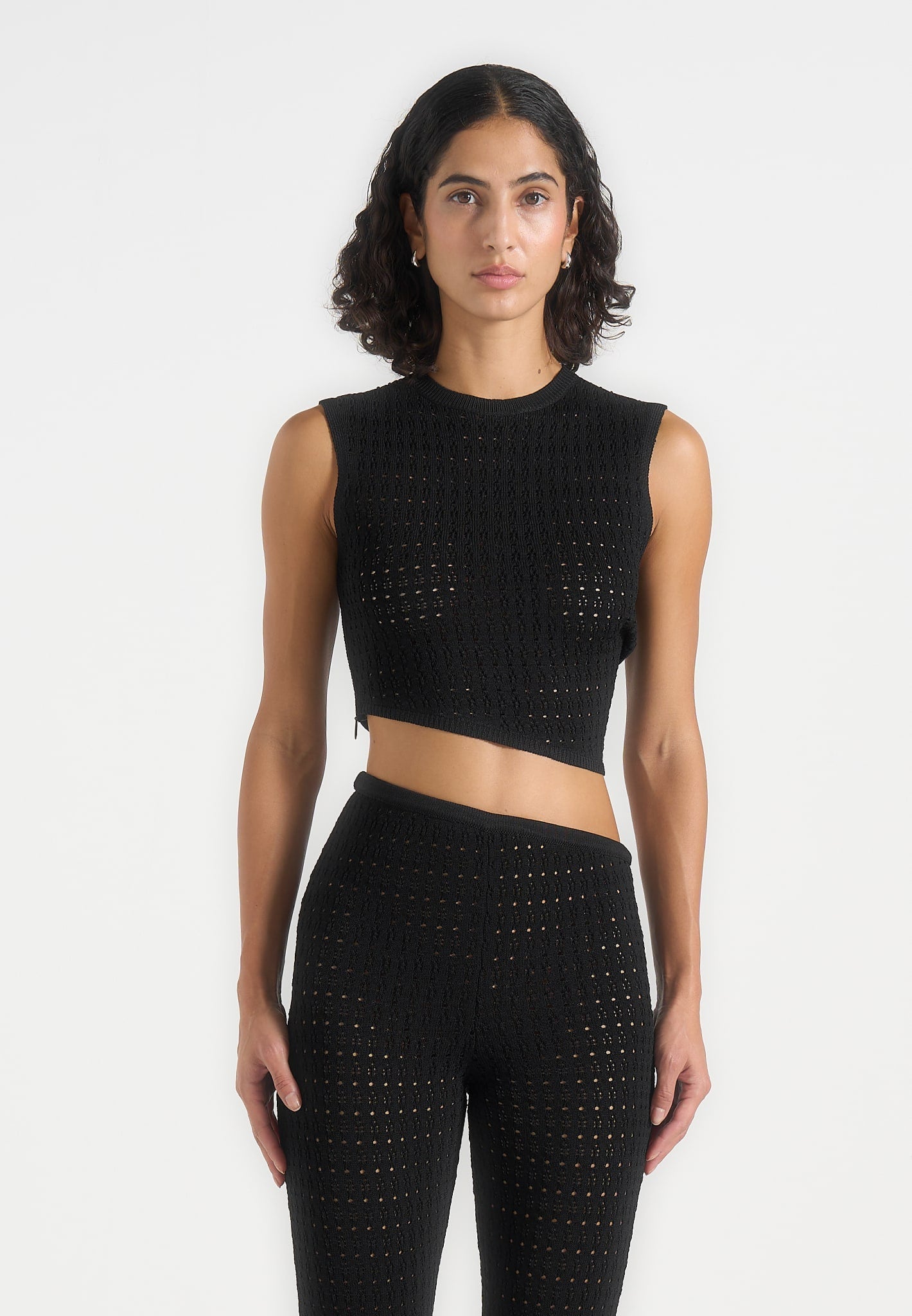 kelsey-pointelle-asymmetric-top-black 