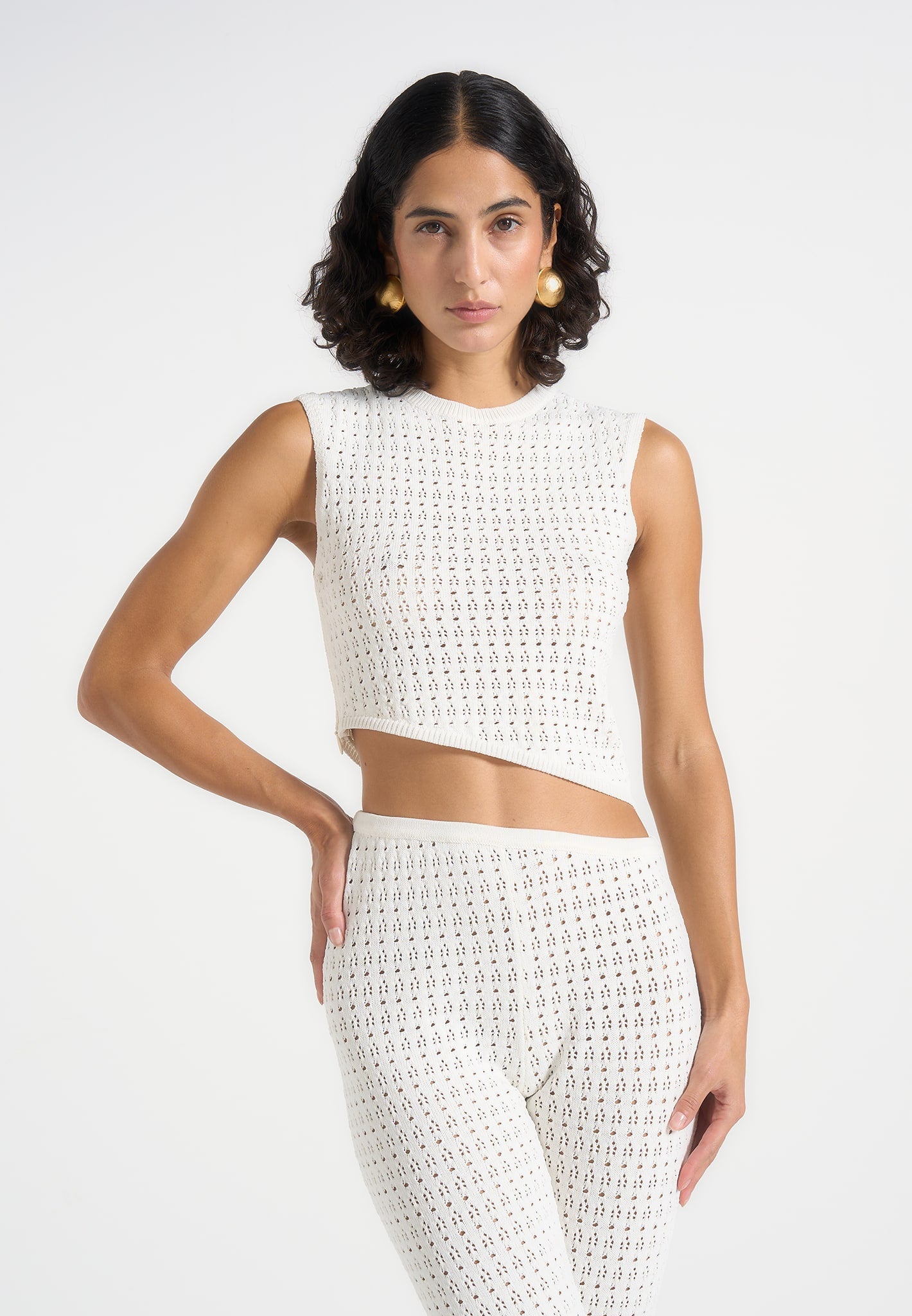 kelsey-pointelle-asymmetric-top-cream 