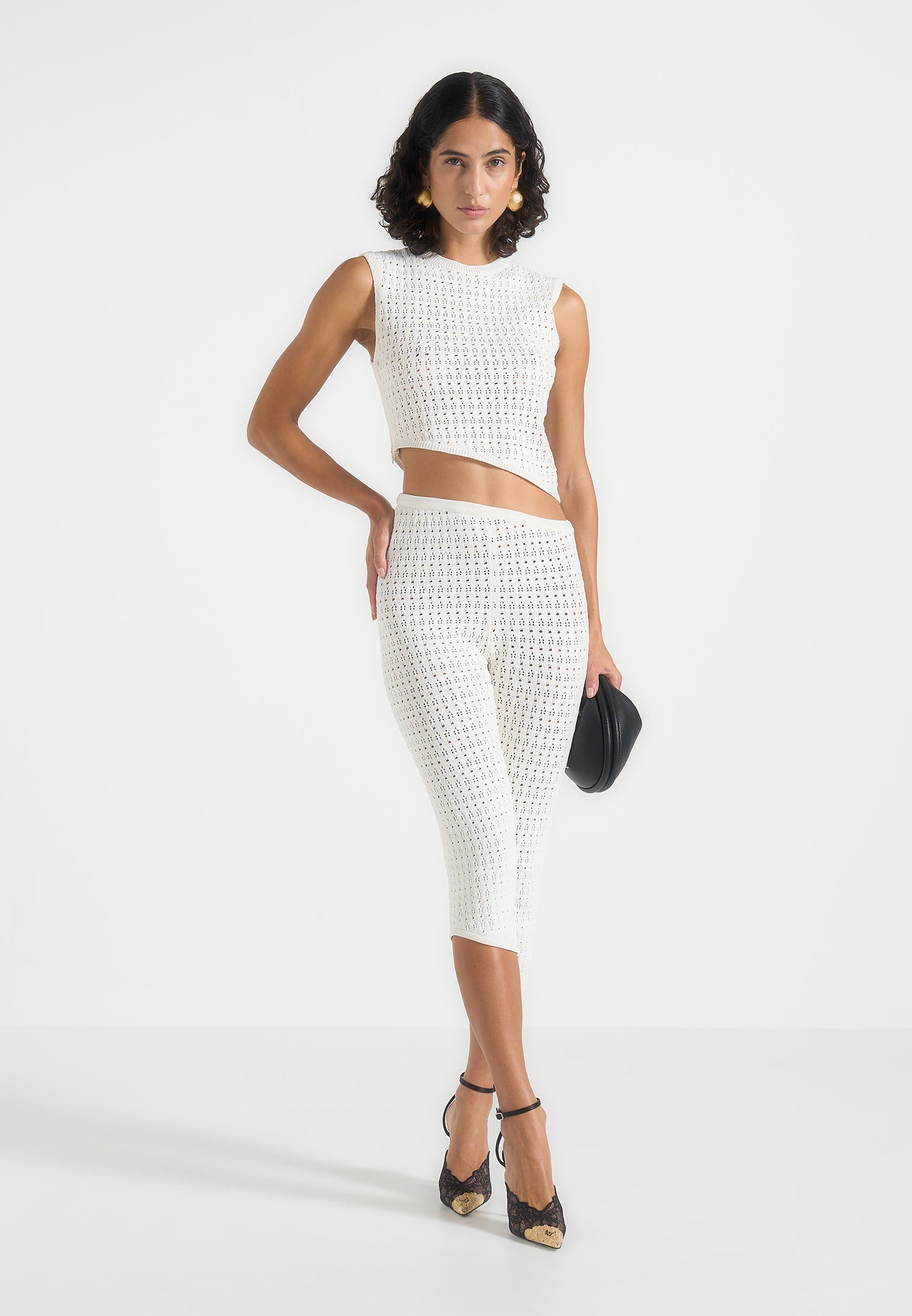 kelsey-pointelle-asymmetric-top-cream 