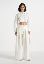 flora-box-pleat-wide-leg-belted-trousers-white