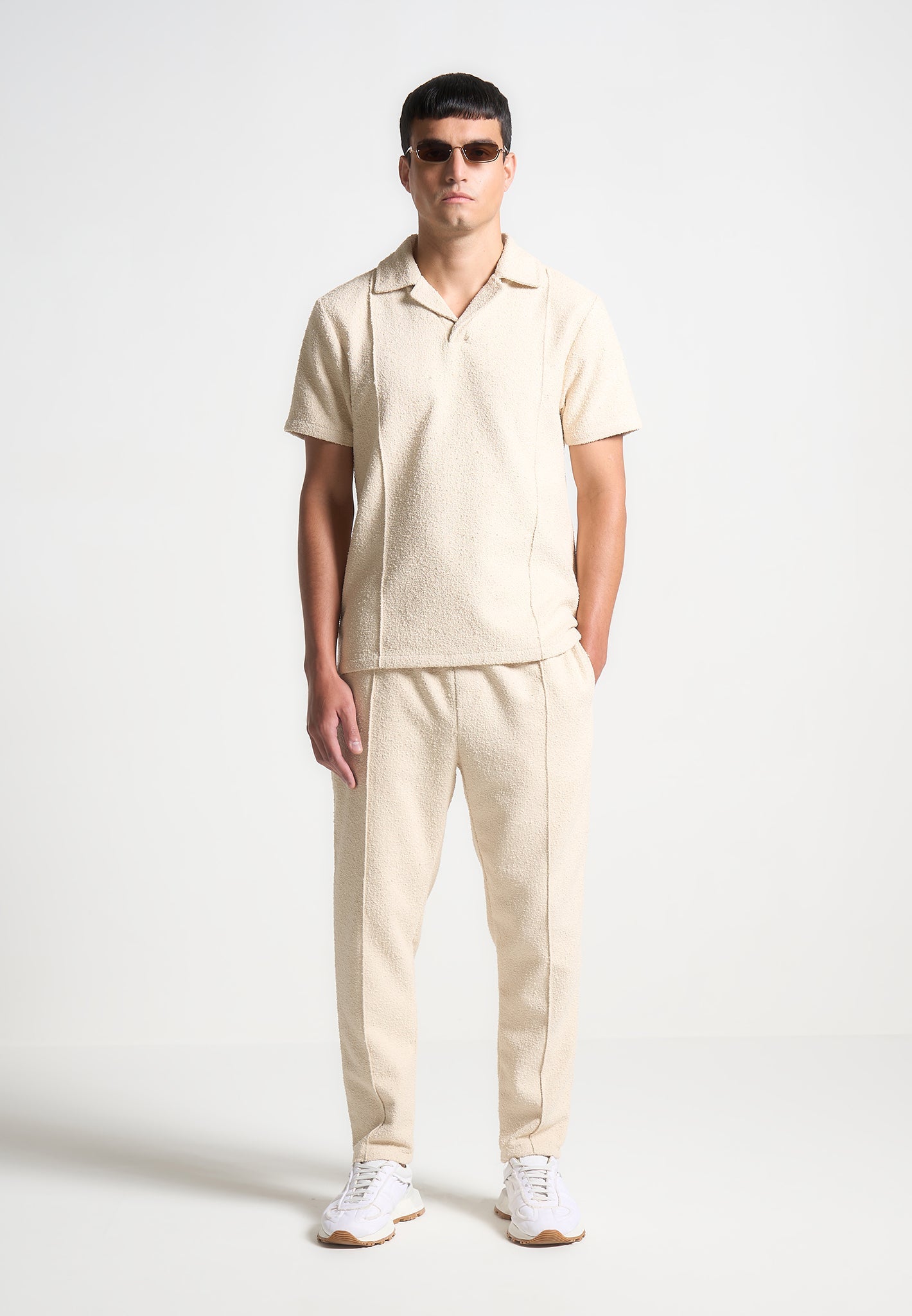 boucle-pintuck-tapered-trousers-beige