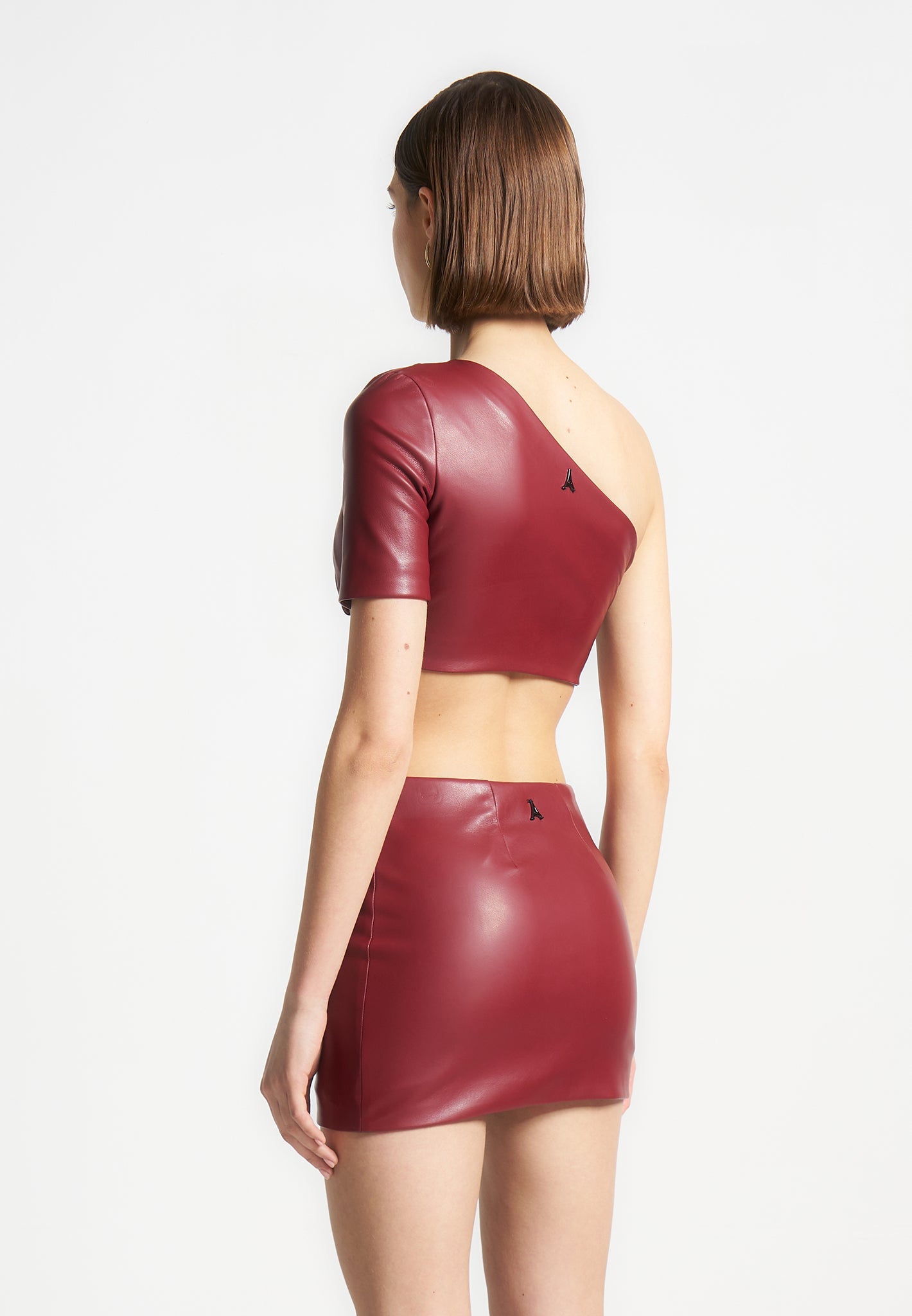 curved-hem-vegan-leather-crop-top-wine-red