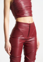 tacked-vegan-leather-flared-trousers-wine-red