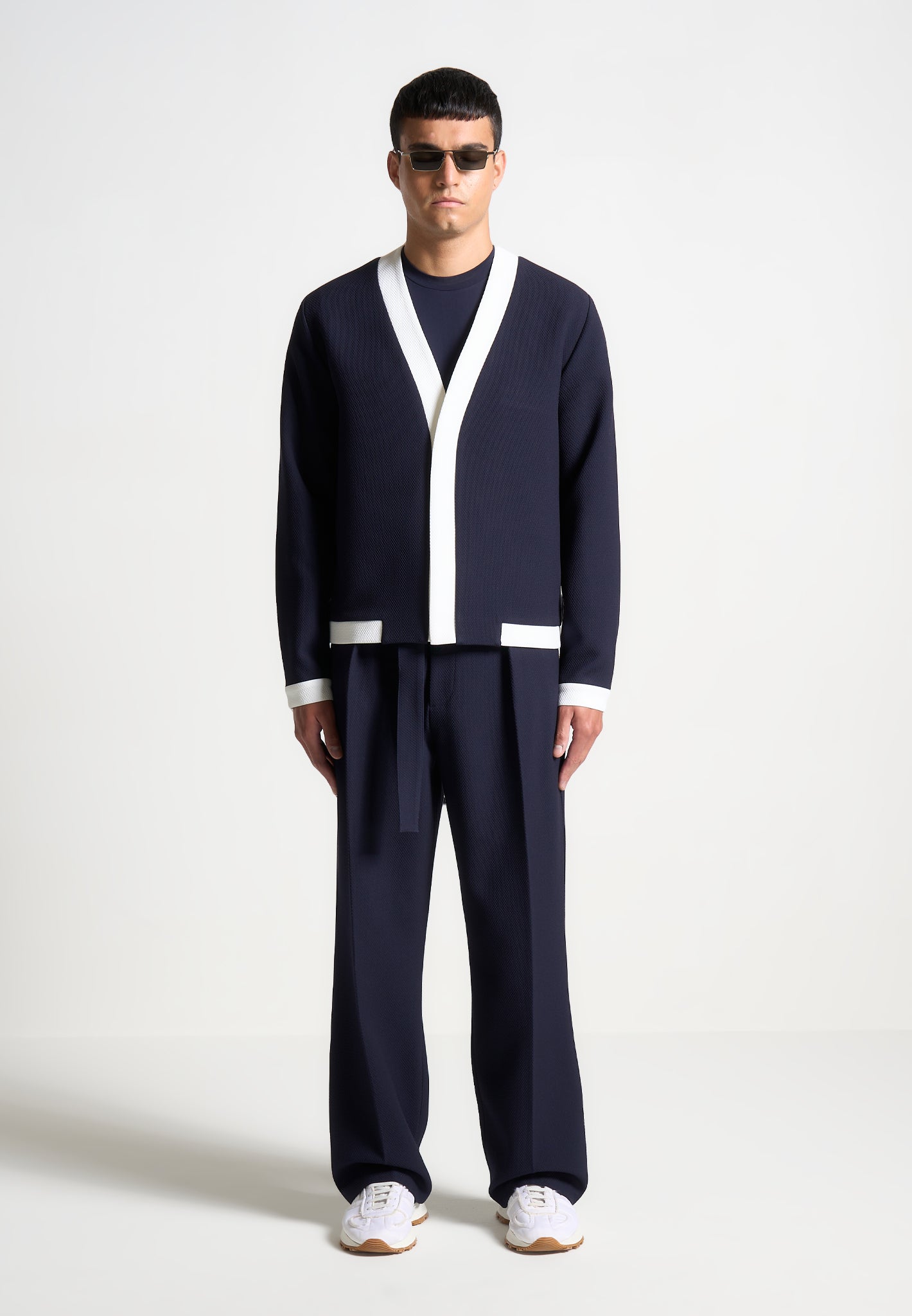 relaxed-fit-textured-belted-tailored-trousers-navy
