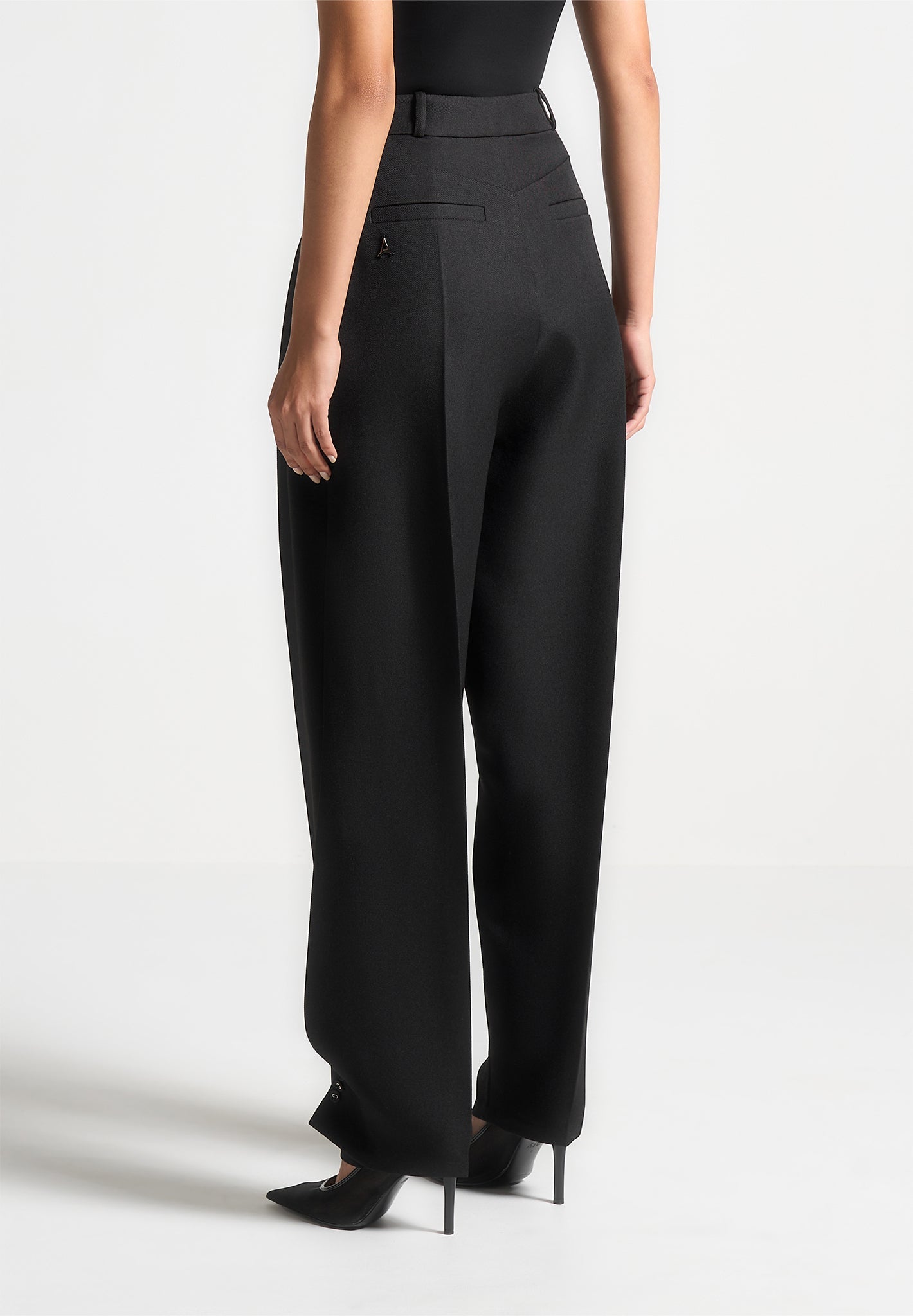 twist-leg-tailored-trousers-black